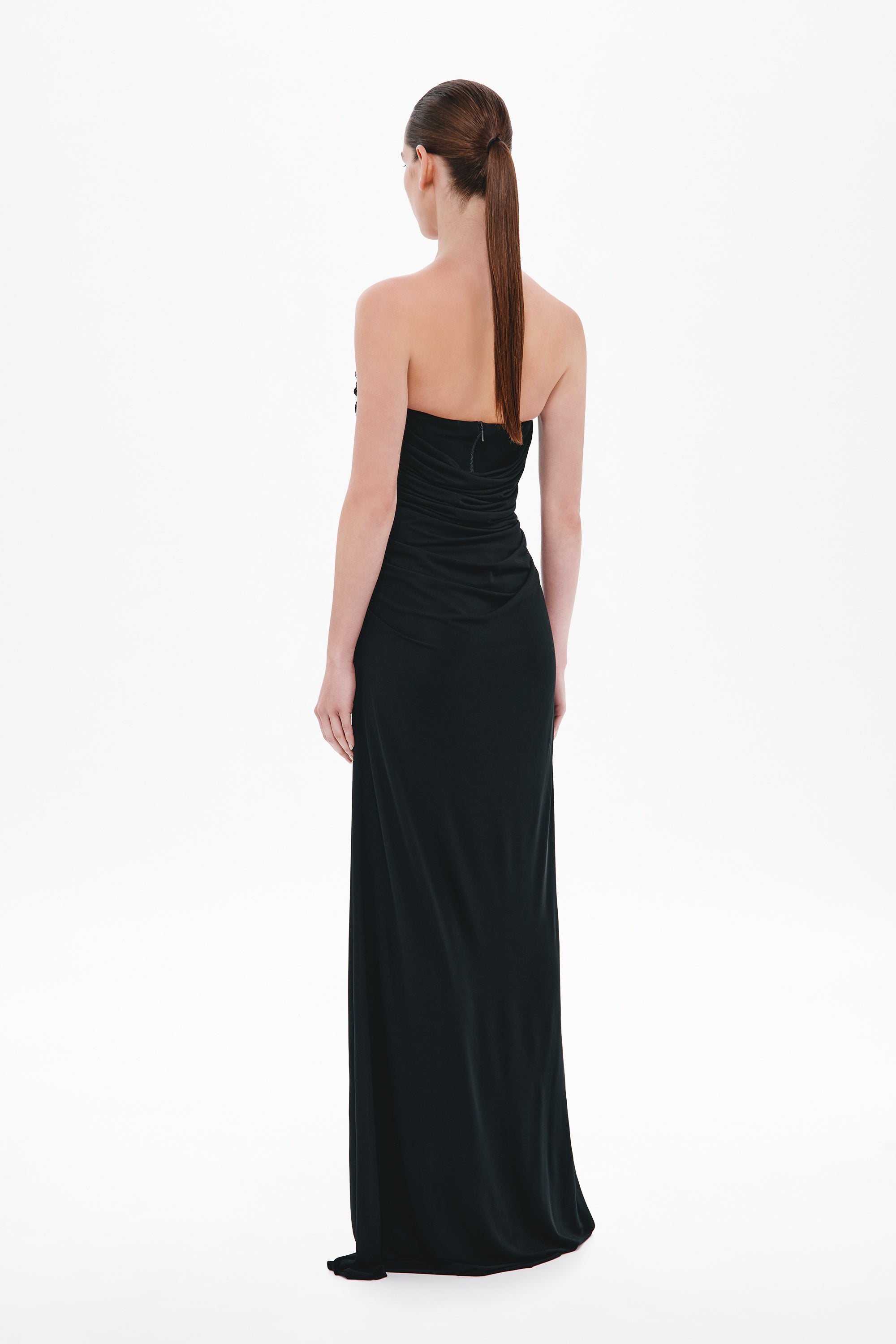Black sleeveless maxi dress with draped back and thin cross-back straps