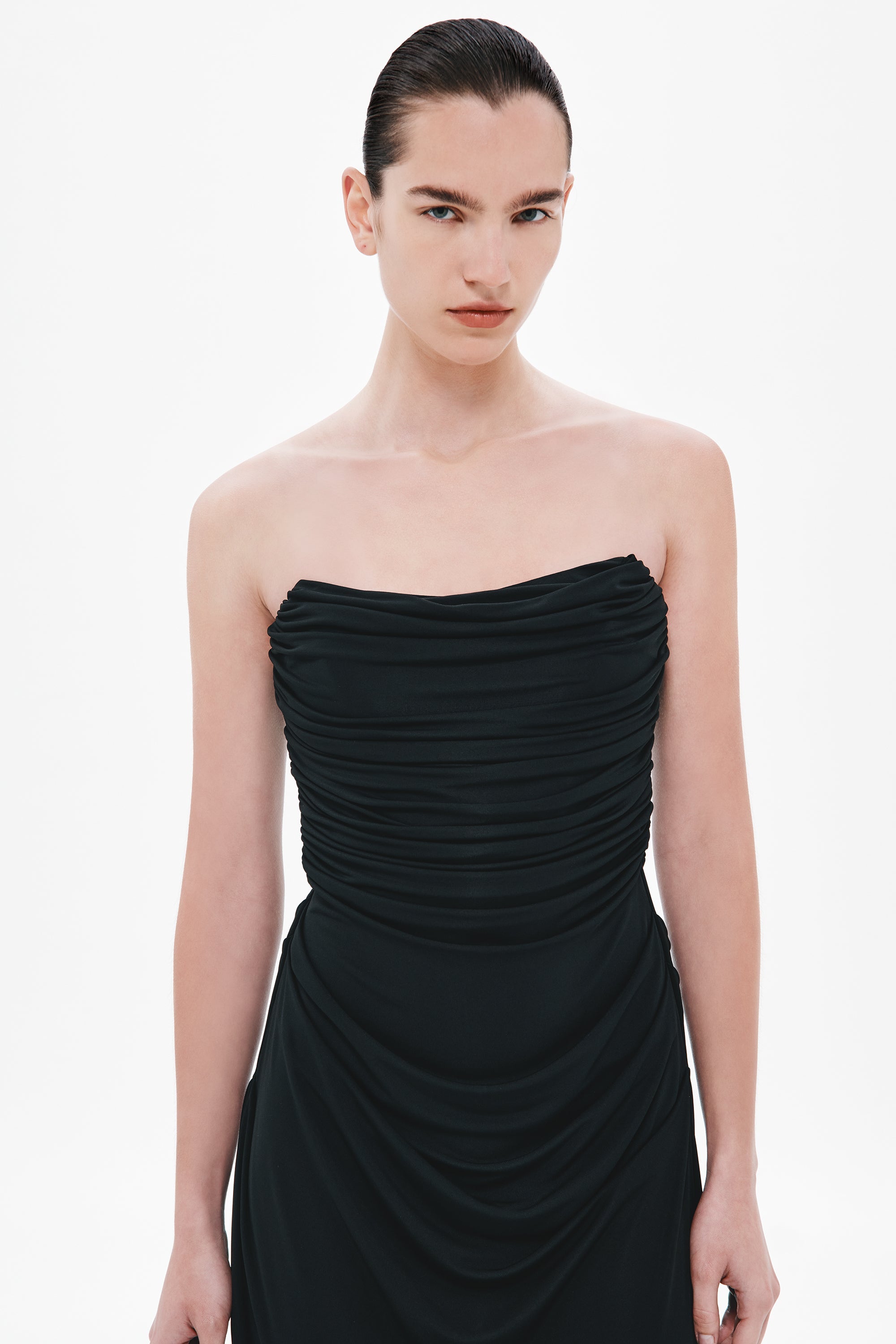 Black strapless draped bodice with layered ruching and gathered neckline
