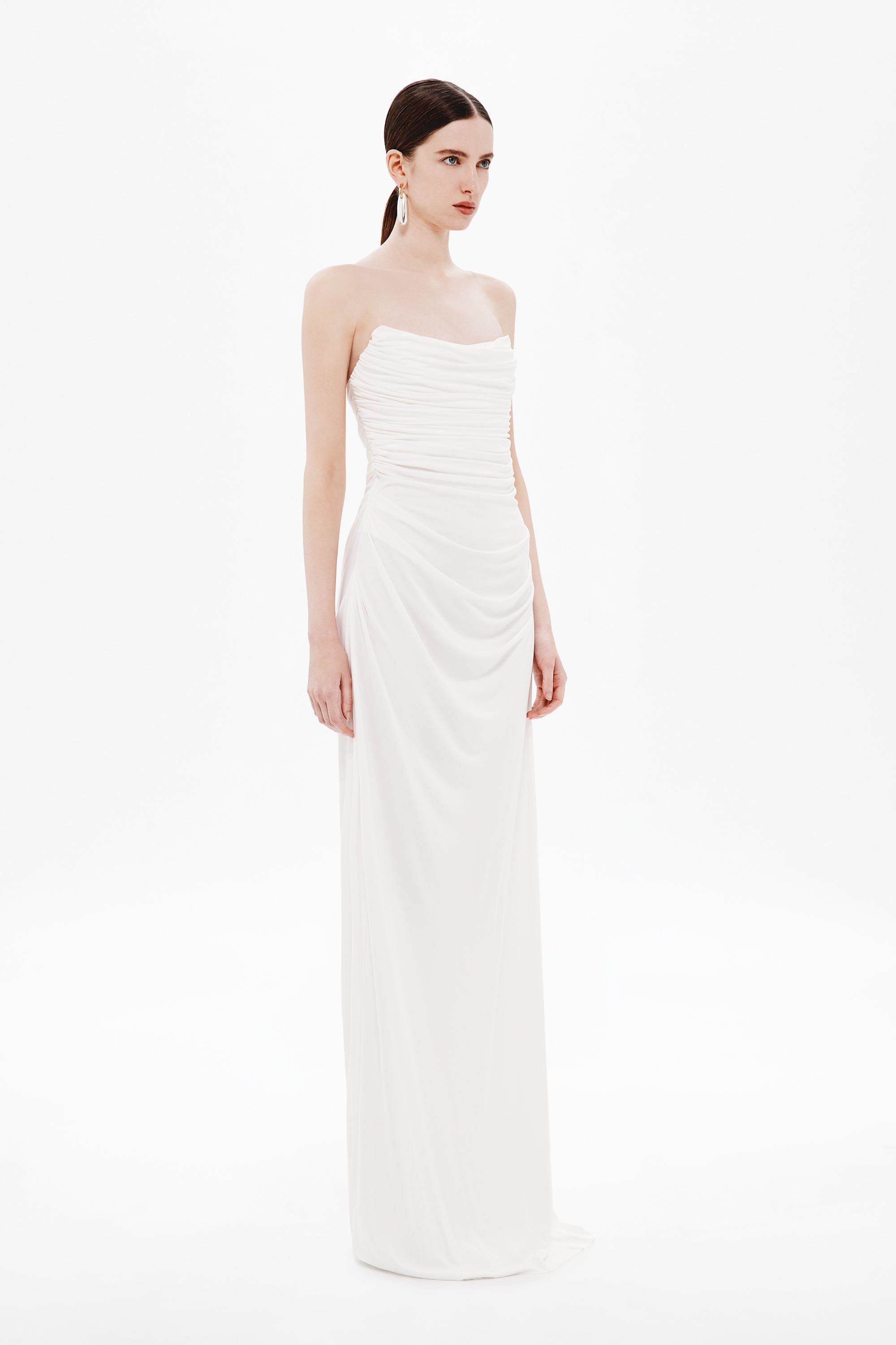 White draped strapless maxi dress with gathered waist and column skirt