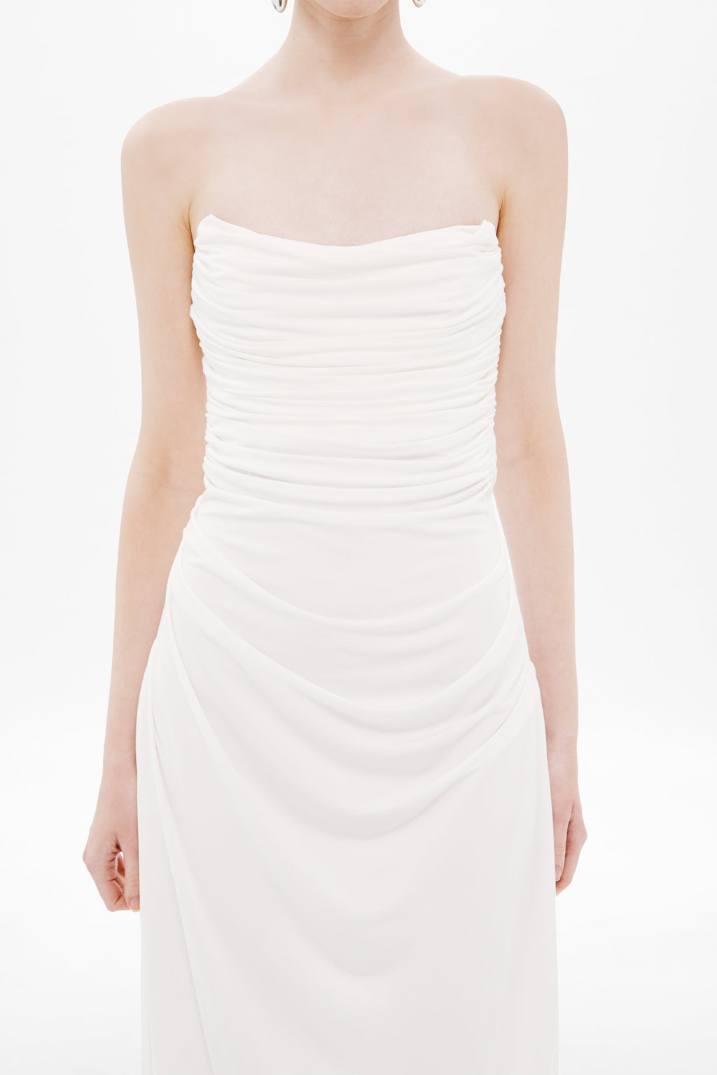 White strapless ruched jersey maxi dress with draped bust and fitted bodice