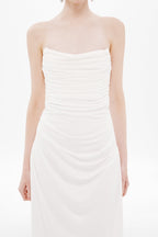 White strapless ruched jersey maxi dress with draped bust and fitted bodice