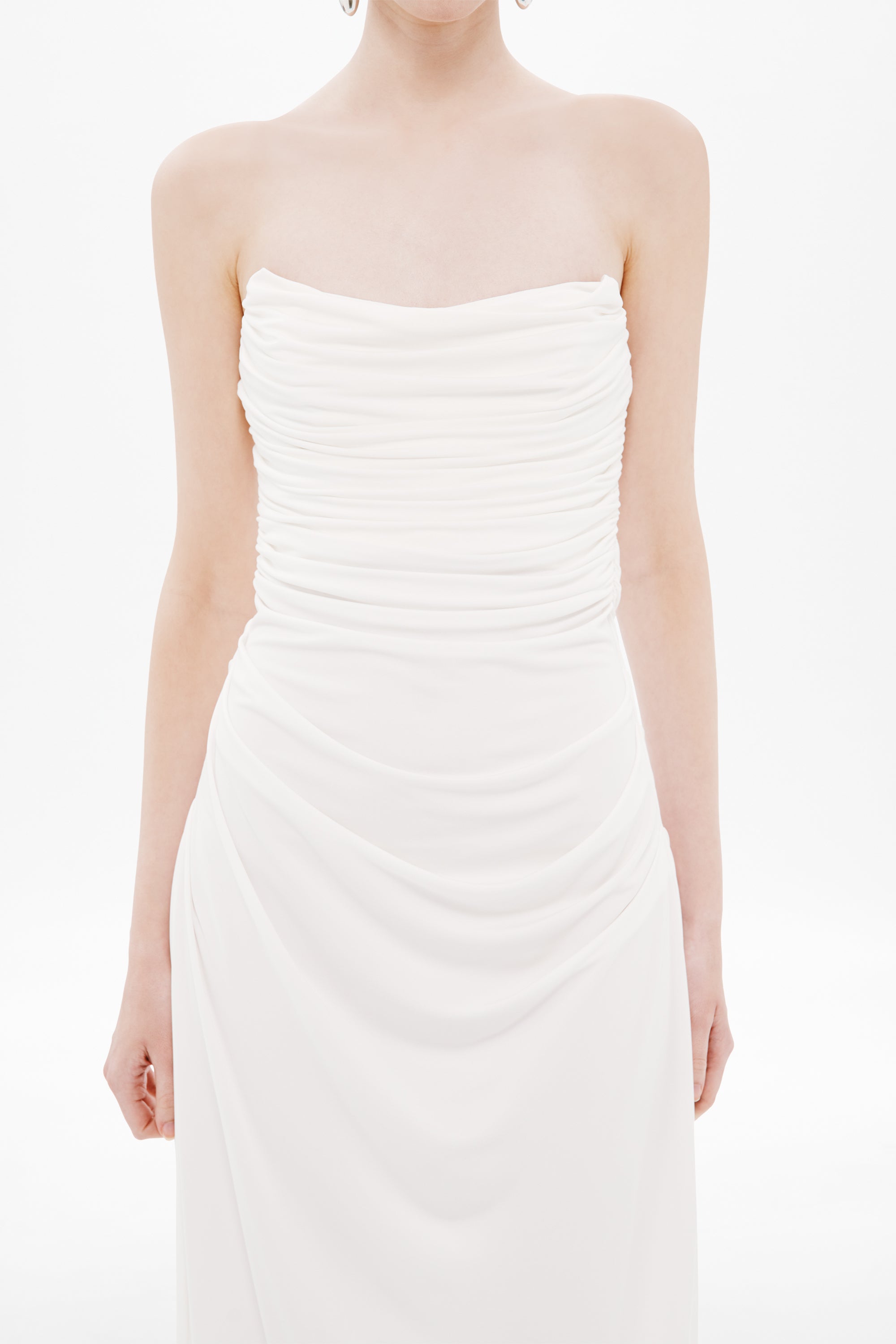 White strapless ruched jersey maxi dress with draped bust and fitted bodice