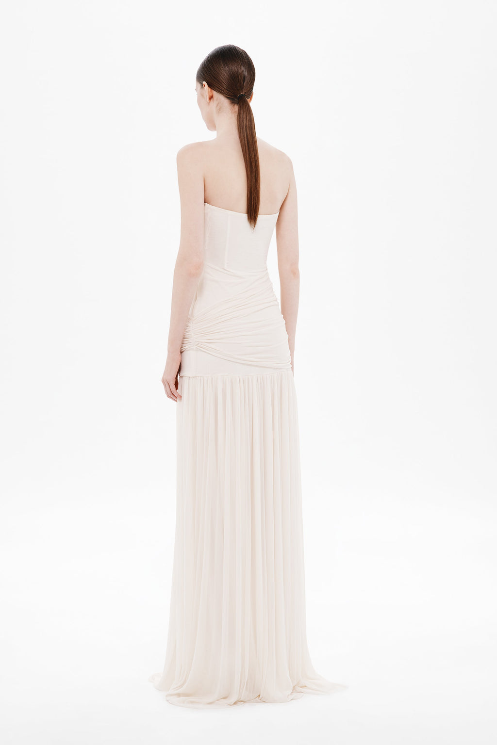 Whisper white strapless maxi dress, back view with draped wrap and tiered skirt