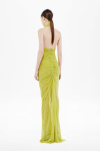 Back view: lime green sleeveless halter braided dress with ruched center and drape