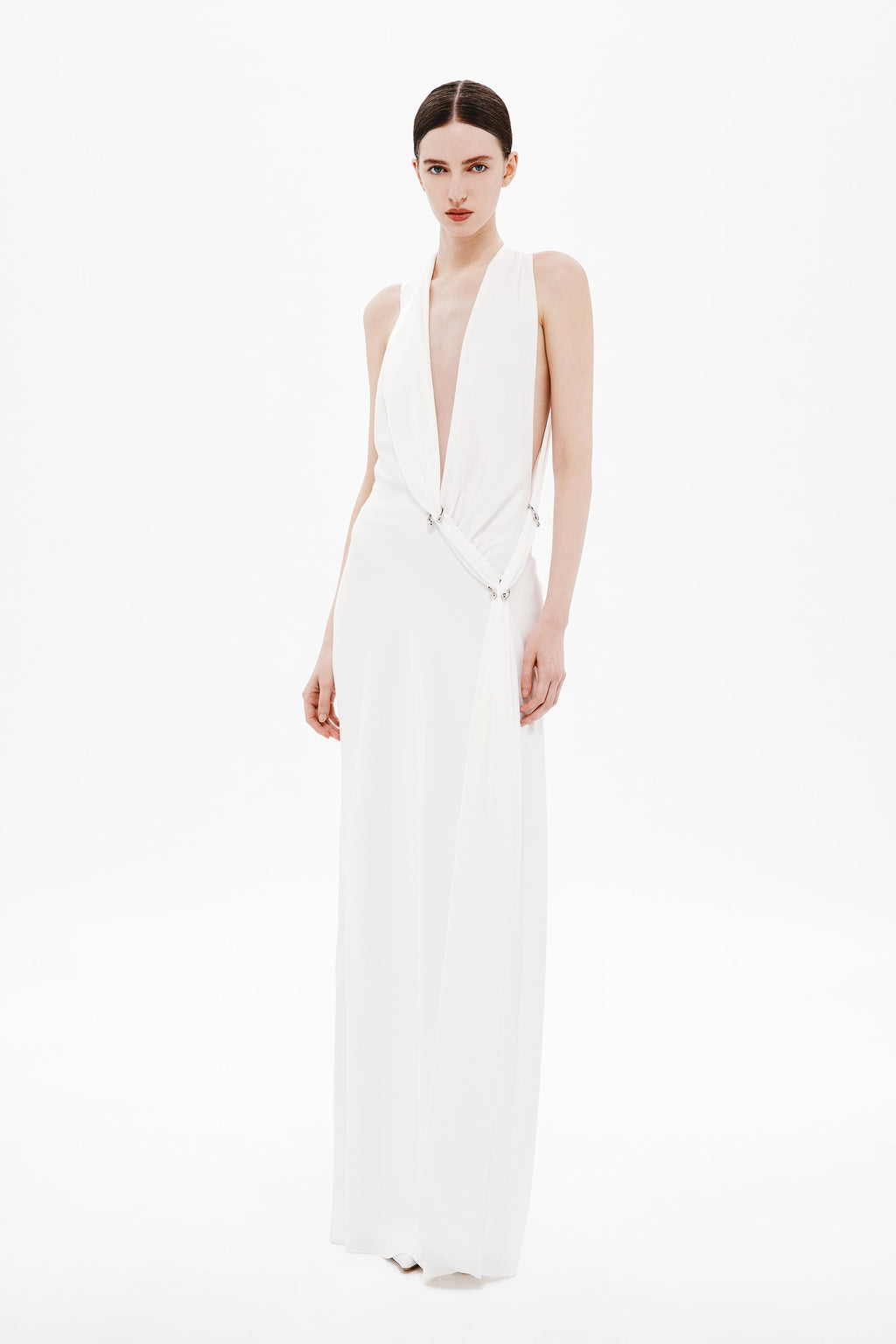 Ivory sleeveless satin wrap dress with deep V neckline and adjustable tie