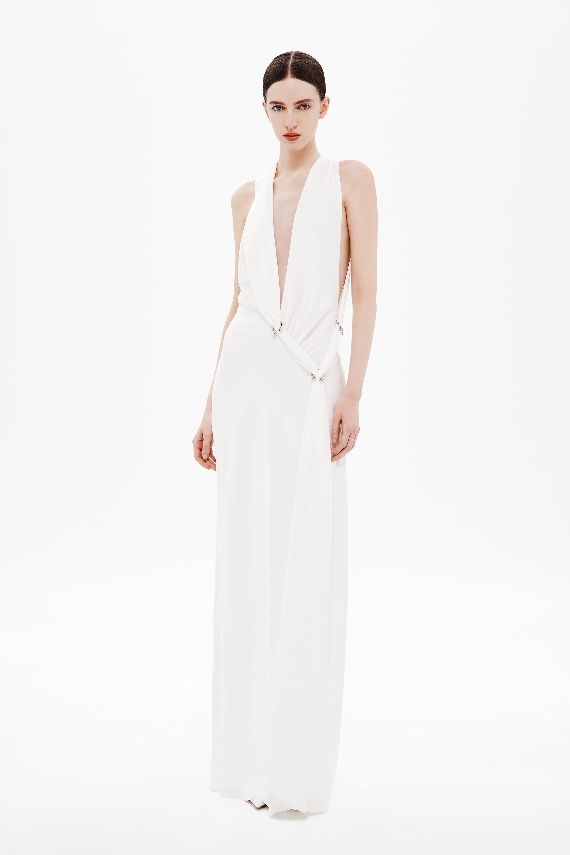 Ivory sleeveless satin wrap dress with deep V neckline and adjustable tie