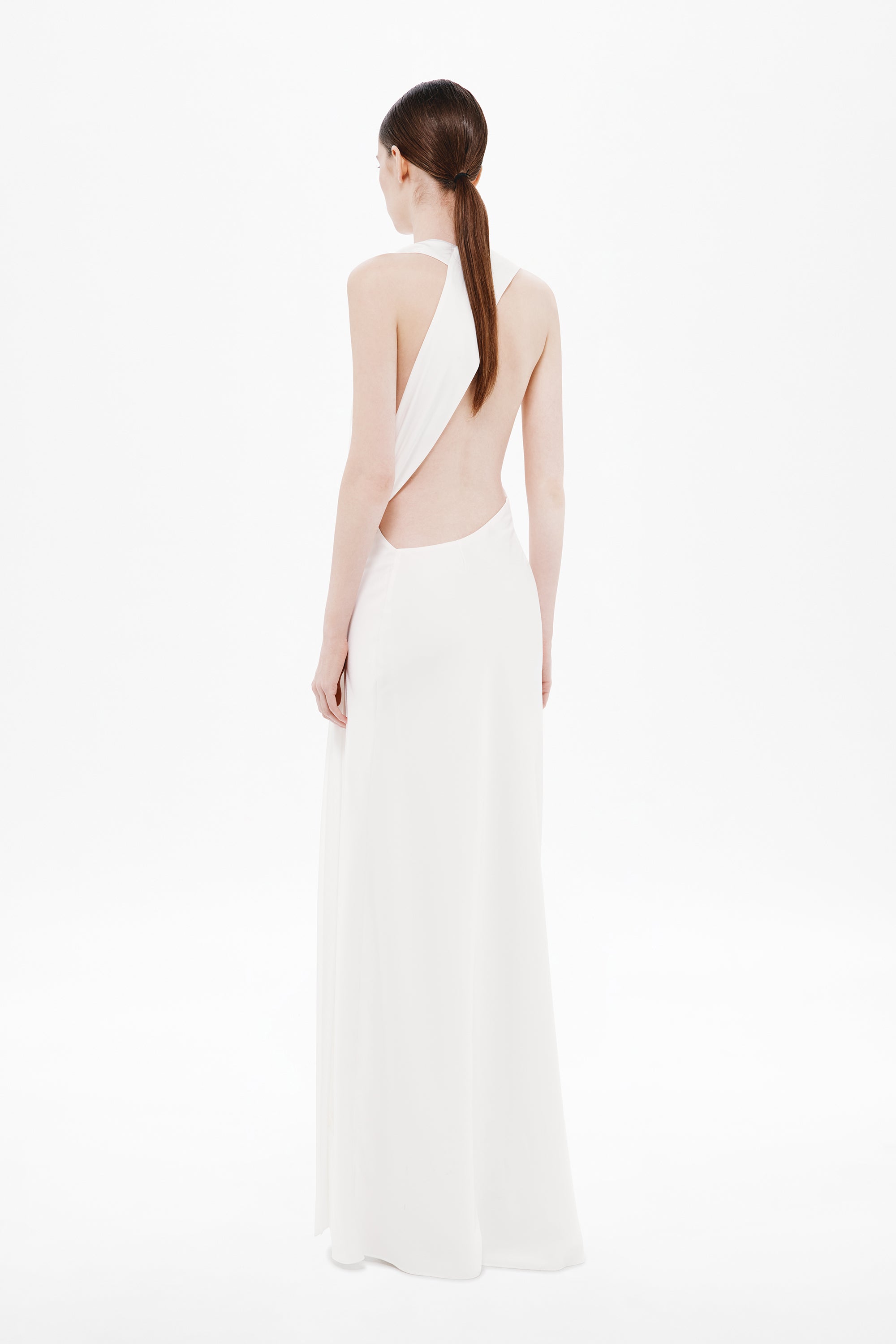 Ivory satin backless dress with halter straps and low back cut