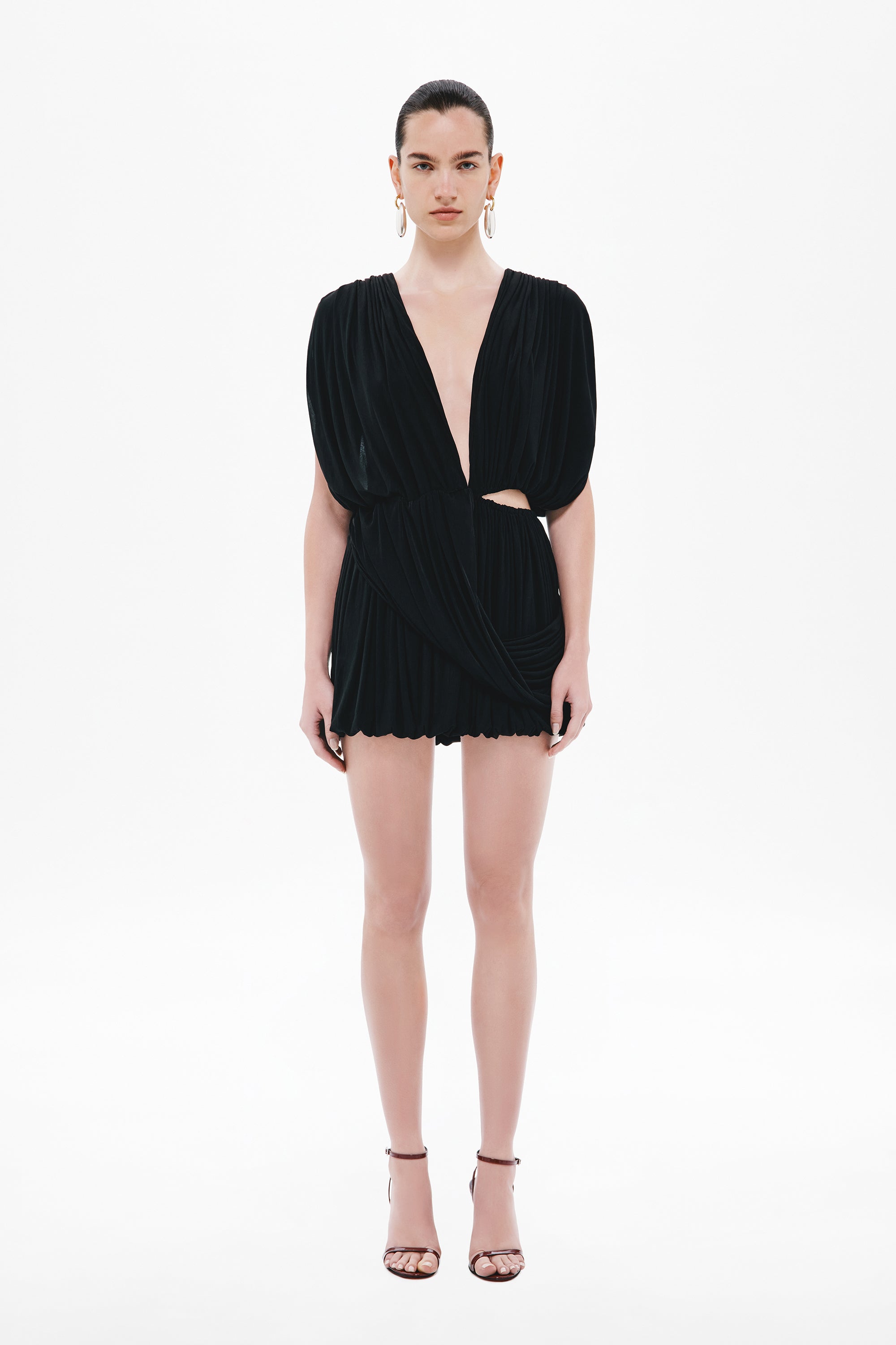 Black jersey mini wrap dress with short puff sleeves and ruffled hem