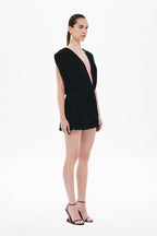 Black jersey mini wrap dress with V neckline and pleated, gathered waist