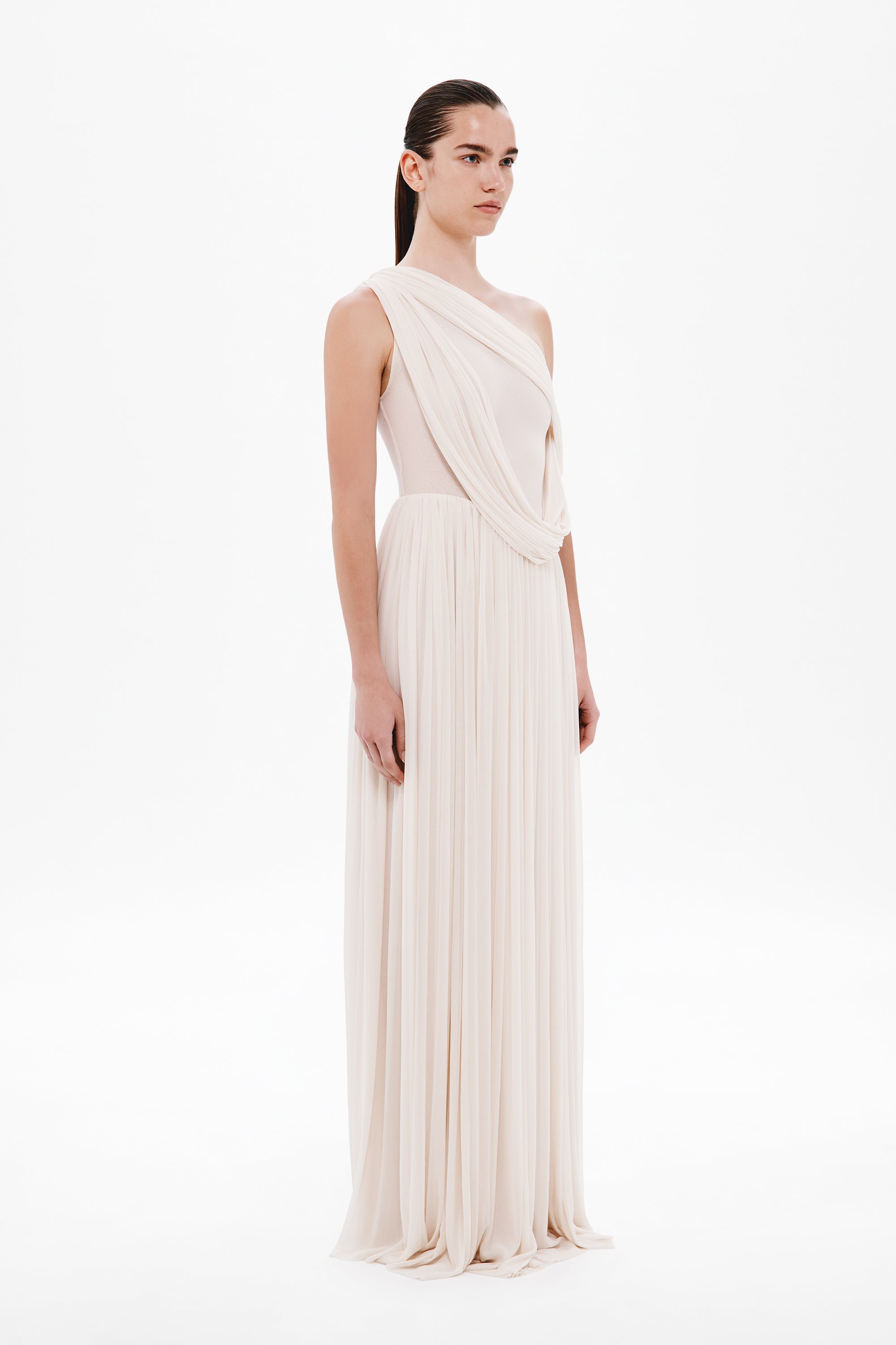 Whisper white one-shoulder draped maxi dress with fitted bodice and pleated skirt