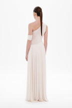 Whisper white backless one-shoulder maxi dress with draped strap and pleated skirt
