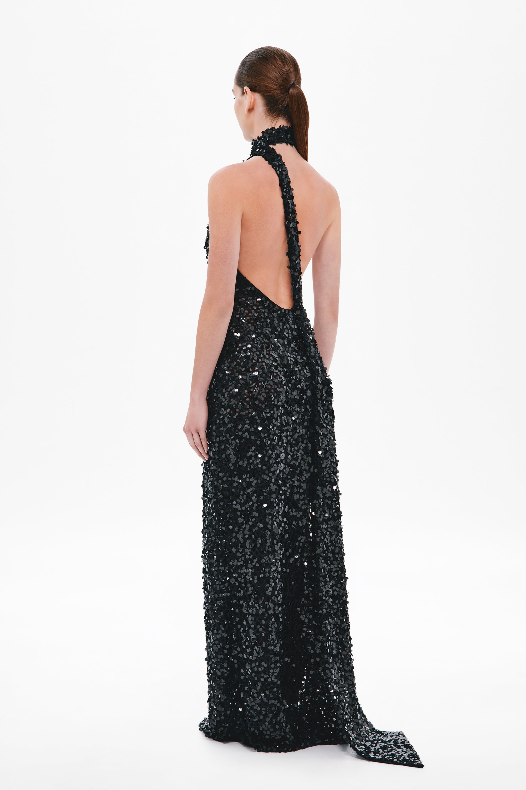 Black halter sequin maxi dress with open back and low V back detail