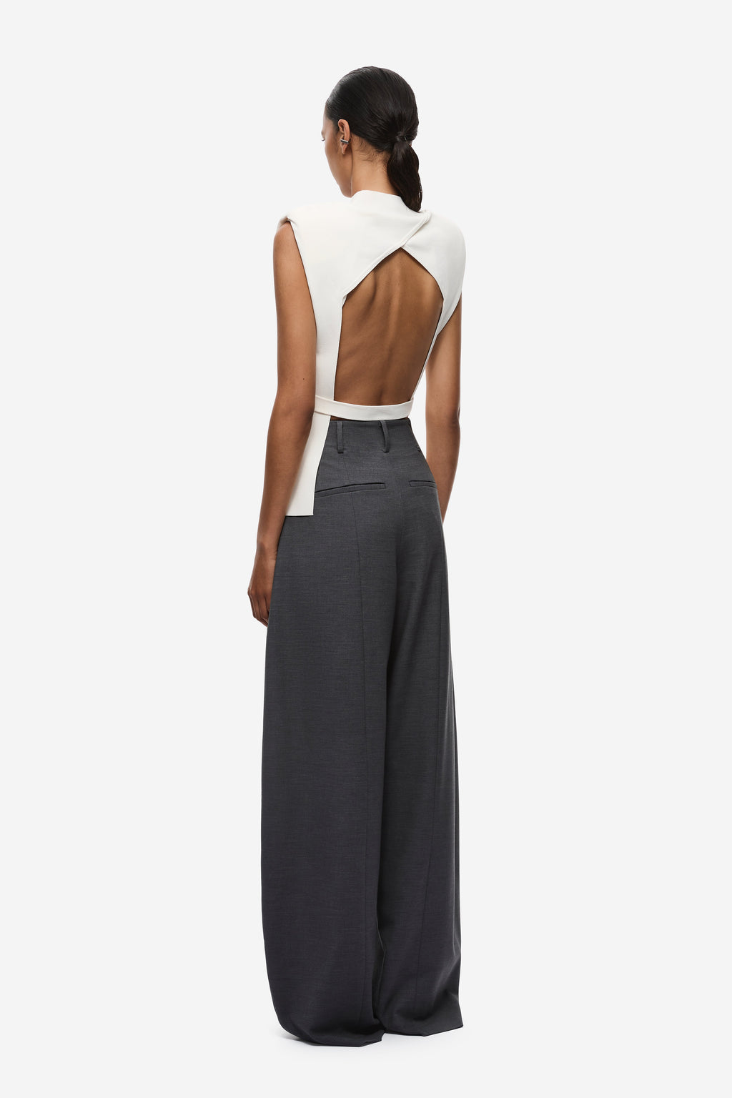 Ivory open-back sleeveless knit top with high neck