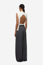 Ivory open-back sleeveless knit top with high neck
