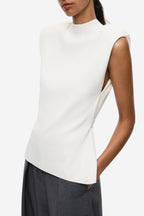 Ivory sleeveless knit top with ribbed high-neck collar