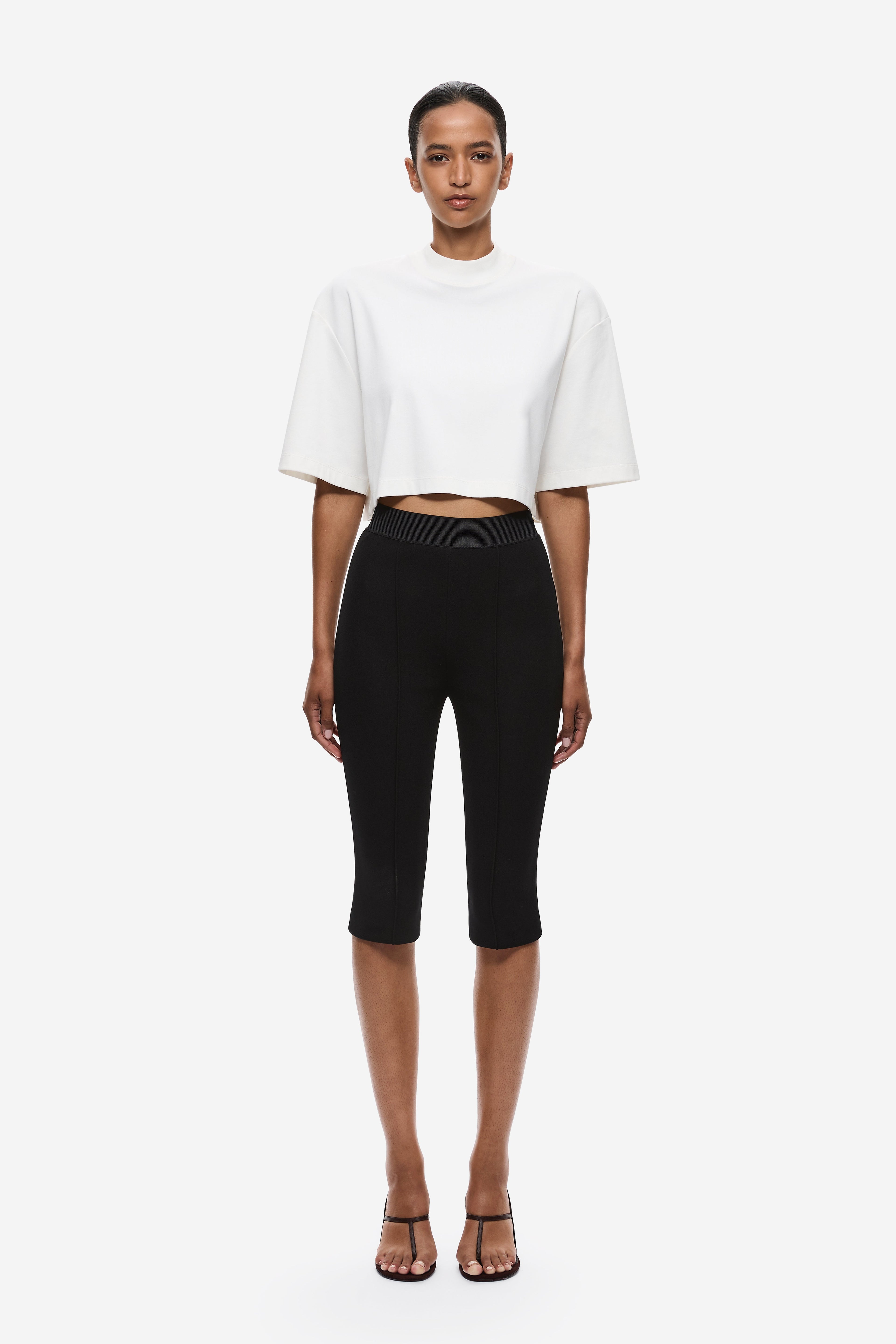 Ivory oversized cropped T-shirt with short sleeves and wide neckline hem