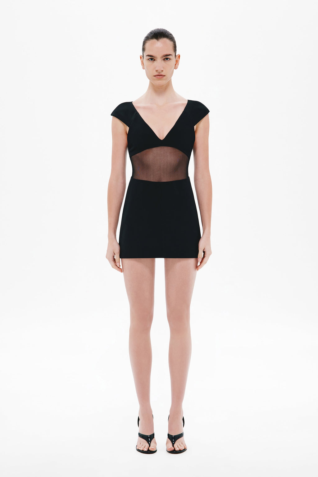 Black mini dress with V-neck, cap sleeves, sheer bonded chest/waist panels