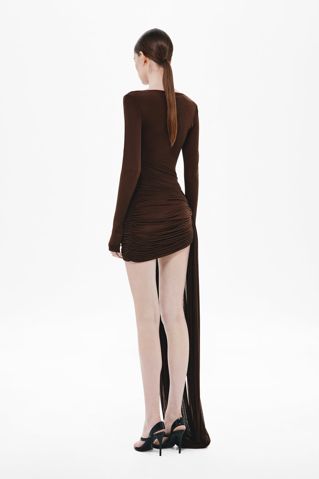 Chocolate long-sleeve mini dress, back view with draped cutout and slit