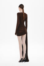 Chocolate long-sleeve mini dress, back view with draped cutout and slit