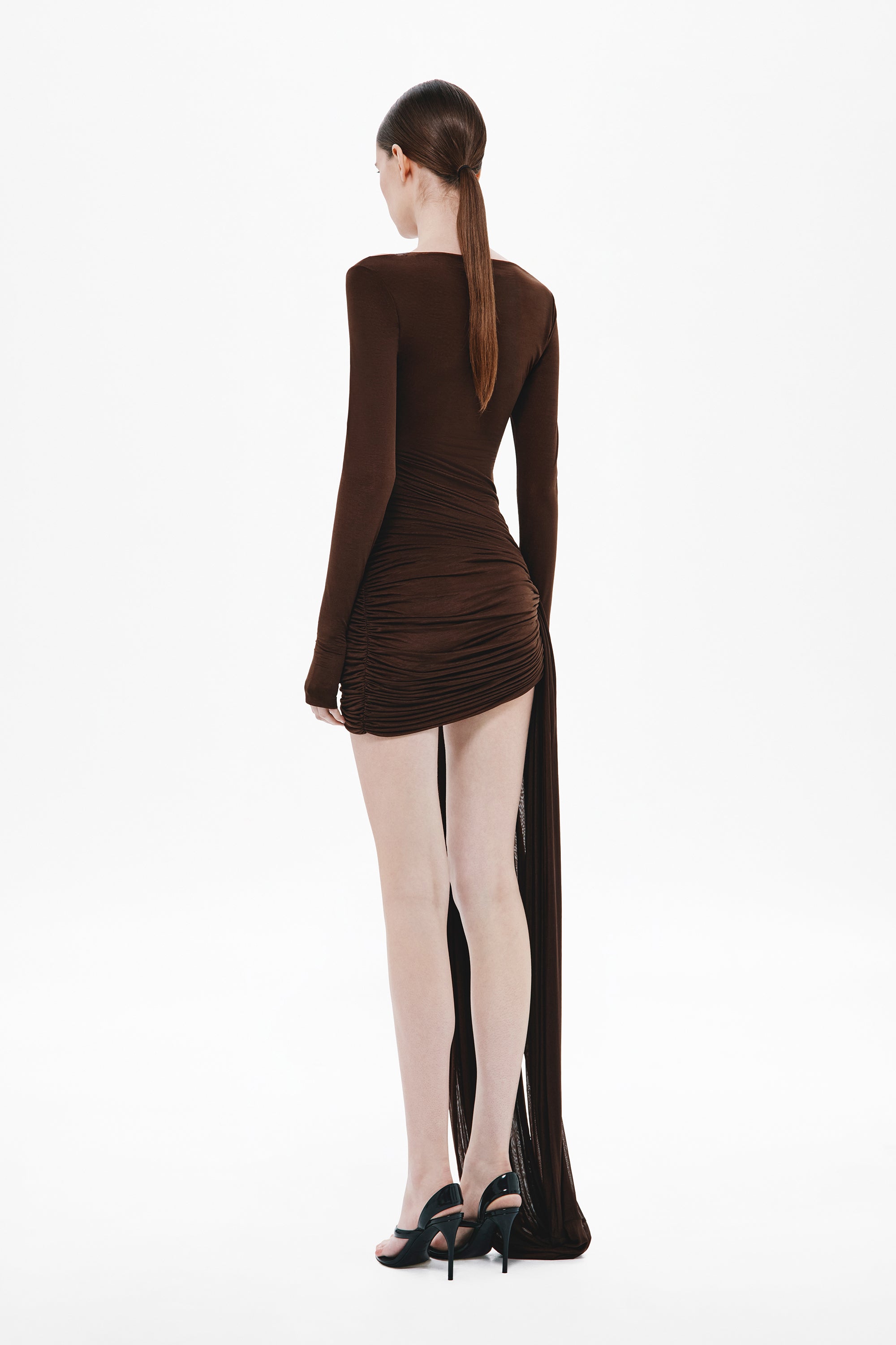 Chocolate long-sleeve mini dress, back view with draped cutout and slit
