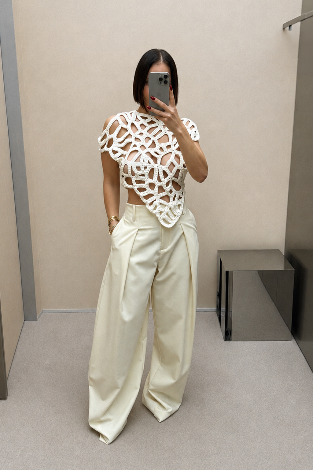 Ivory crochet top with openwork lattice design, high neckline, cap sleeves