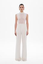 Whisper white sleeveless mock-neck bodysuit, full-length fitted silhouette