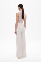 Whisper white sleeveless mock-neck bodysuit, back view with high neckline