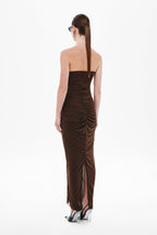 Back view of dark brown strapless ruched midi jersey dress with center seam detail