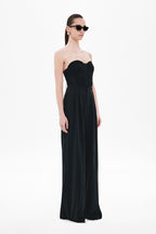 Black strapless sweetheart jersey top, side view with fitted waist