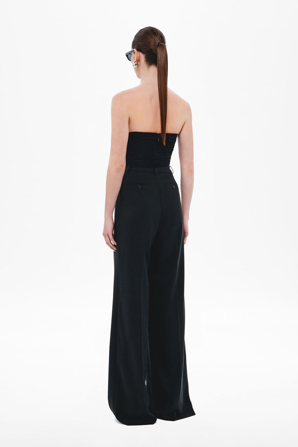 Black strapless sweetheart jersey top, back view with vertical seam