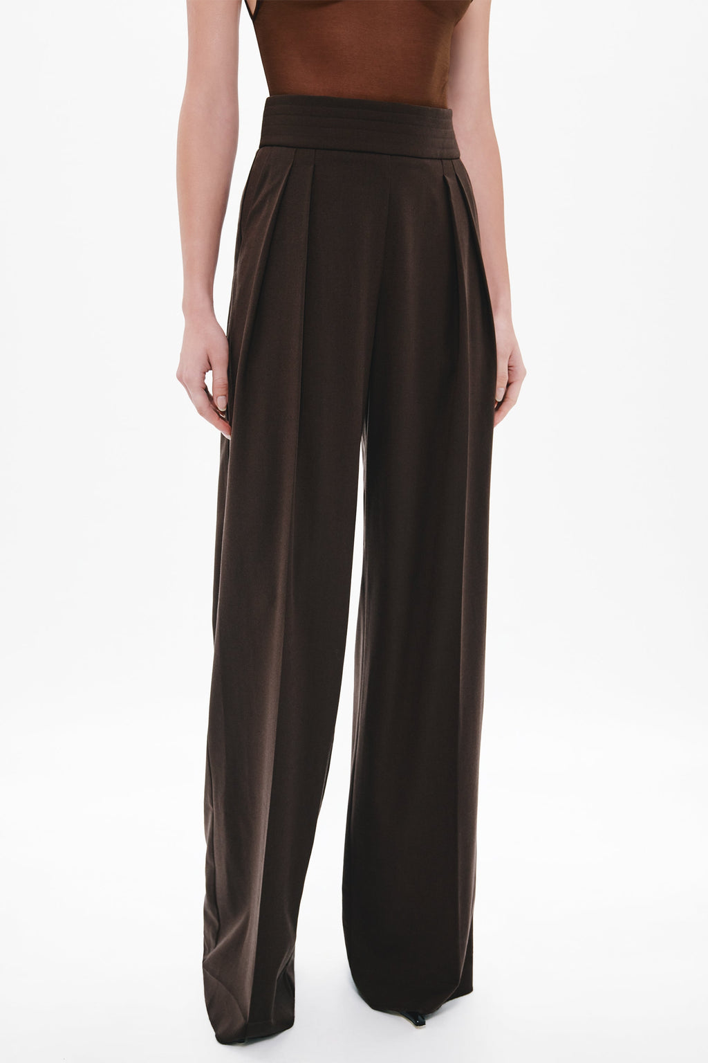Chocolate two-pleat suiting pants, pleated waistband close-up and wide leg opening
