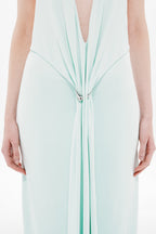 Mint green jersey dress with ruched front and center tie detail with metal grommet