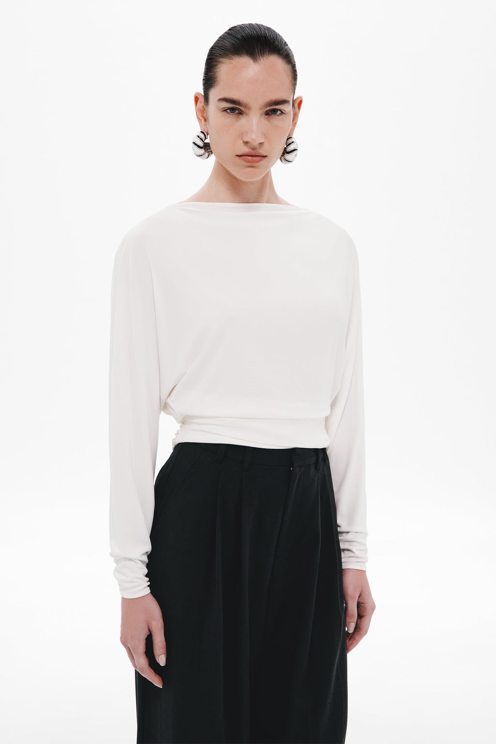 Ivory long-sleeve jersey top with crew neckline and relaxed fit