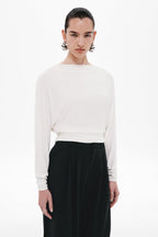 Ivory long-sleeve jersey top with crew neckline and relaxed fit