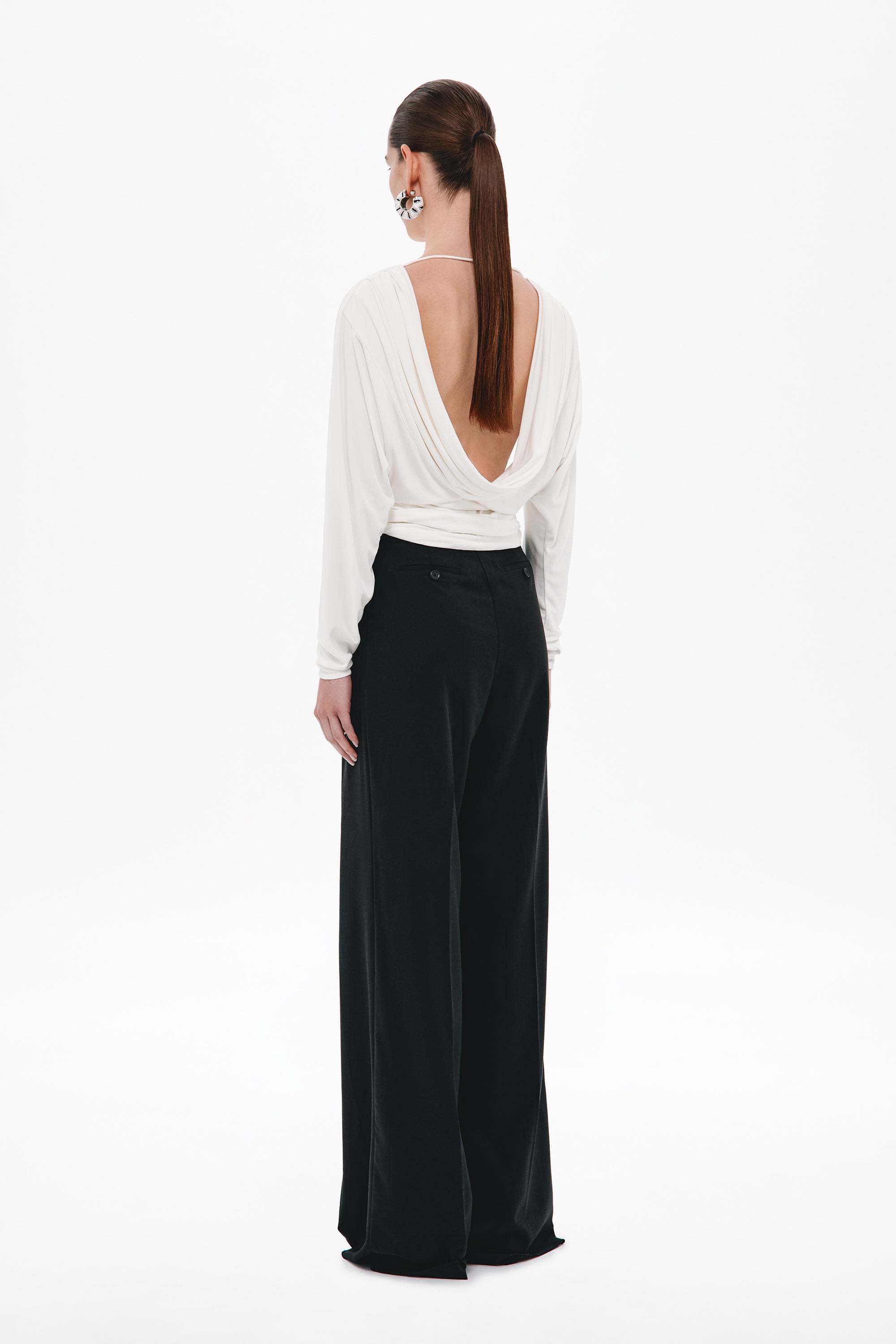 Ivory jersey long-sleeve top with low V-back and draped cowl