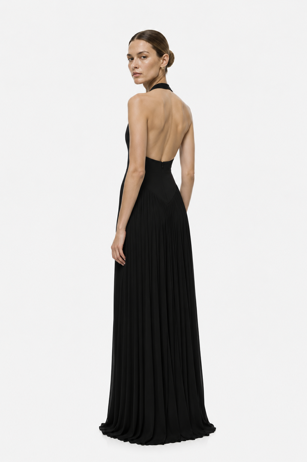Black halter jersey maxi dress with open back and pleated skirt