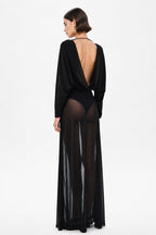 Black stocking-style dress with long sleeves, deep back cutout, sheer skirt panel