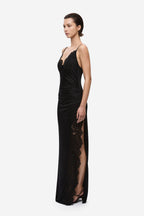 Black jersey maxi dress with lace-trim slit and spaghetti straps