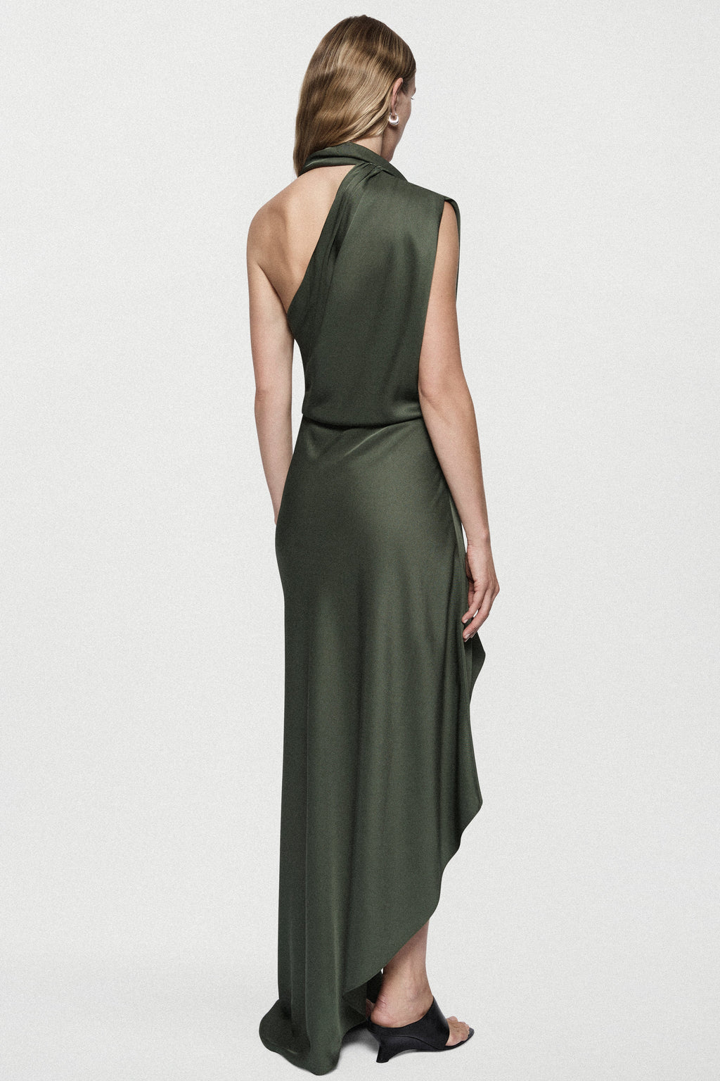 Hunter green satin halter mini dress with open back and draped asymmetrical hem
