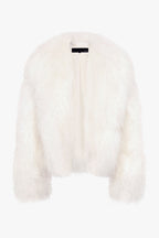 Ivory shearling coat back view with central vent and short collar