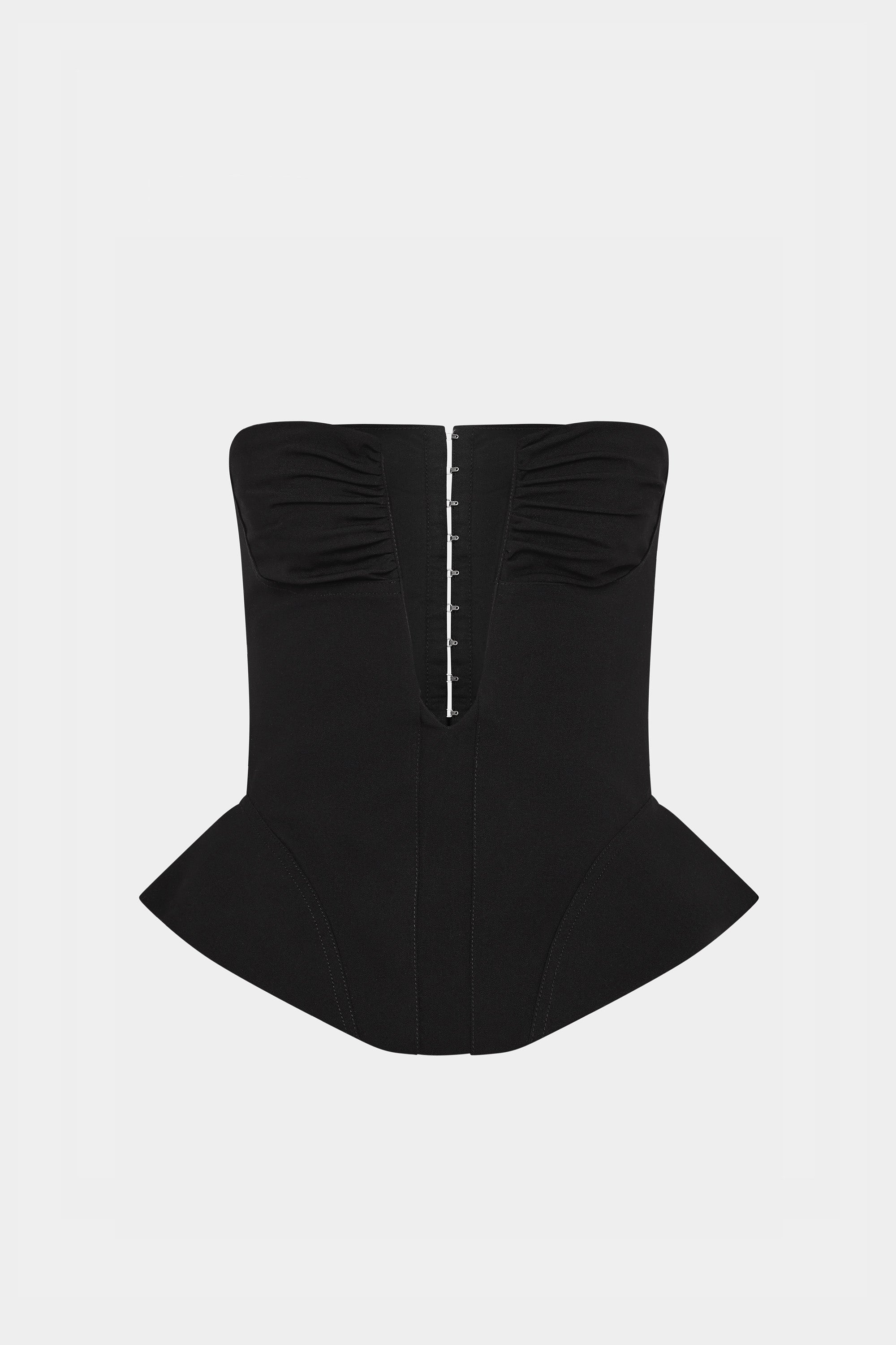 Black strapless corset top with boned front and curved peplum hem