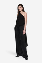 Black one-shoulder draped jersey bodysuit with straight, wide-leg silhouette
