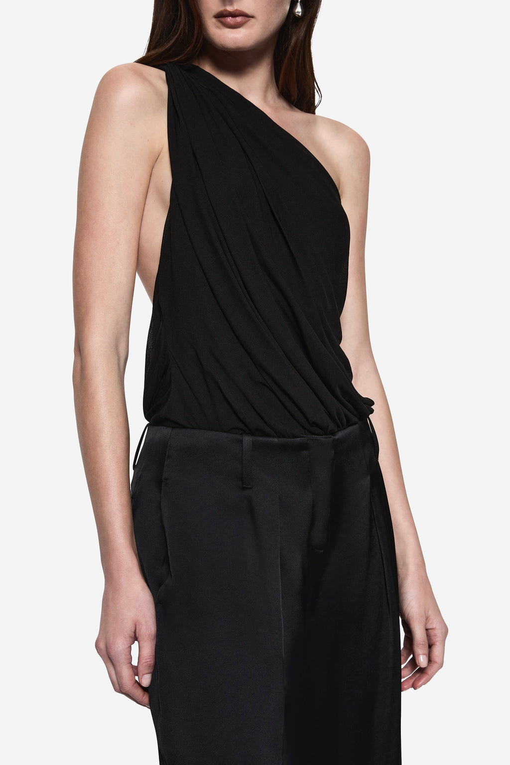Black one-shoulder draped jersey bodysuit with diagonal ruching at the waist
