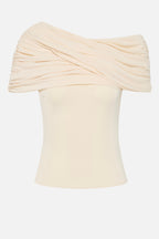 Cream jersey top with wide draped cowl neckline and short sleeves, side view.