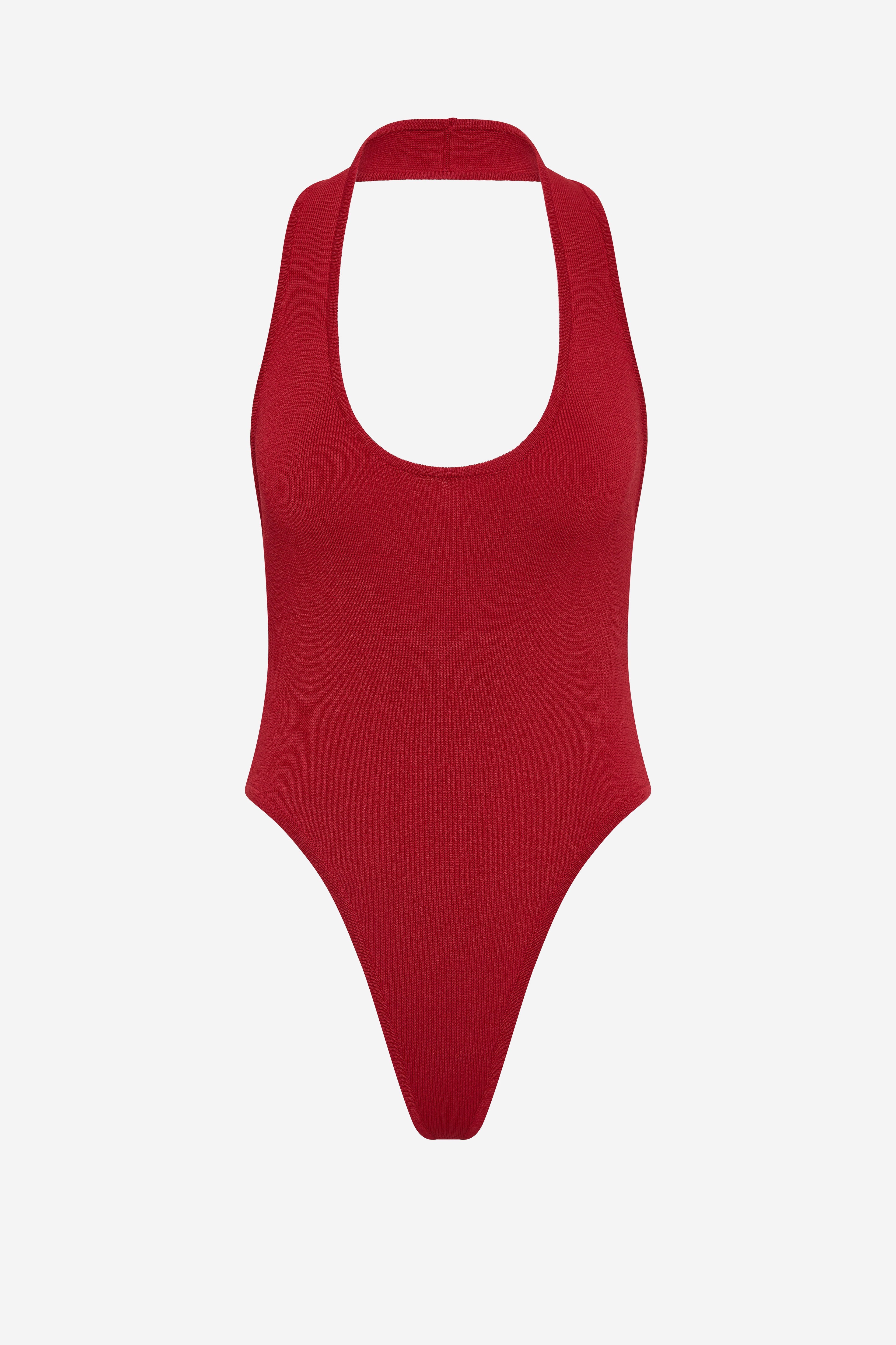 Cherry red knit halter bodysuit with deep scoop front and high-cut leg