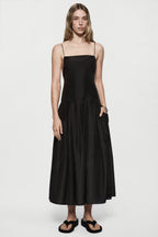 Black silk sundress with spaghetti straps, midi length, gathered skirt
