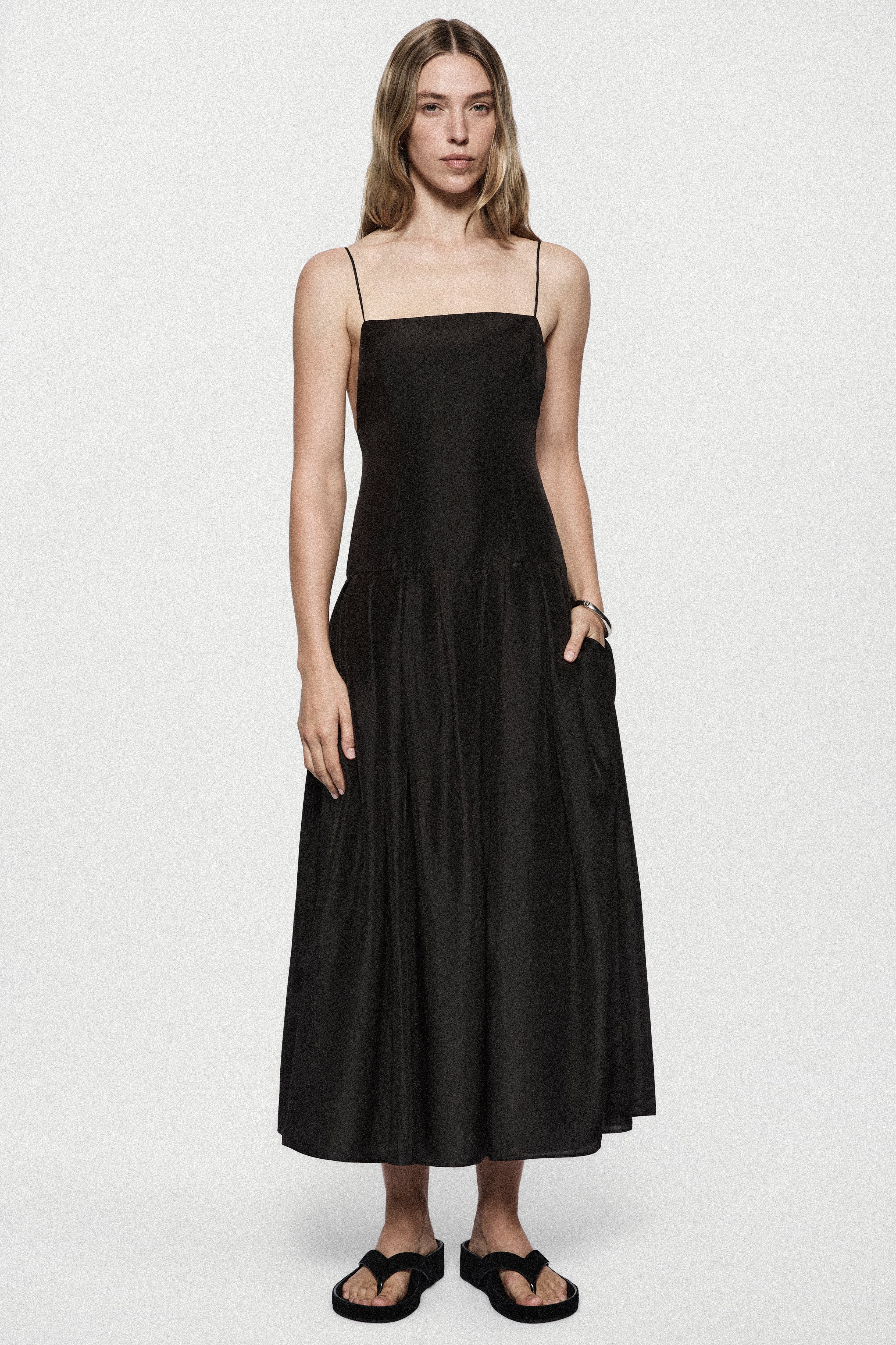 Black silk sundress with spaghetti straps, midi length, gathered skirt