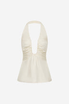 Off-white silk halter top with deep V neckline and ruched bust