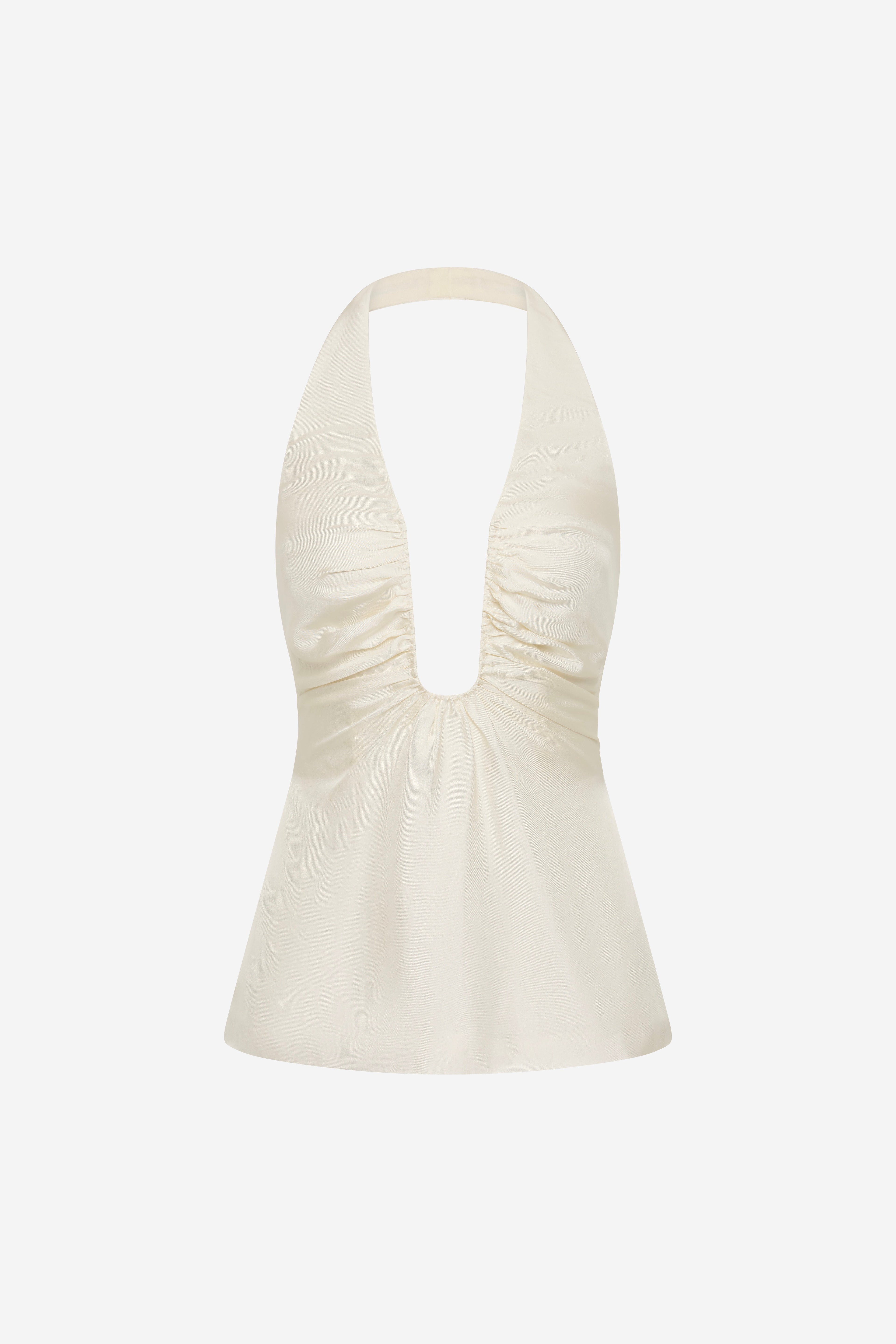 Off-white silk halter top with deep V neckline and ruched bust