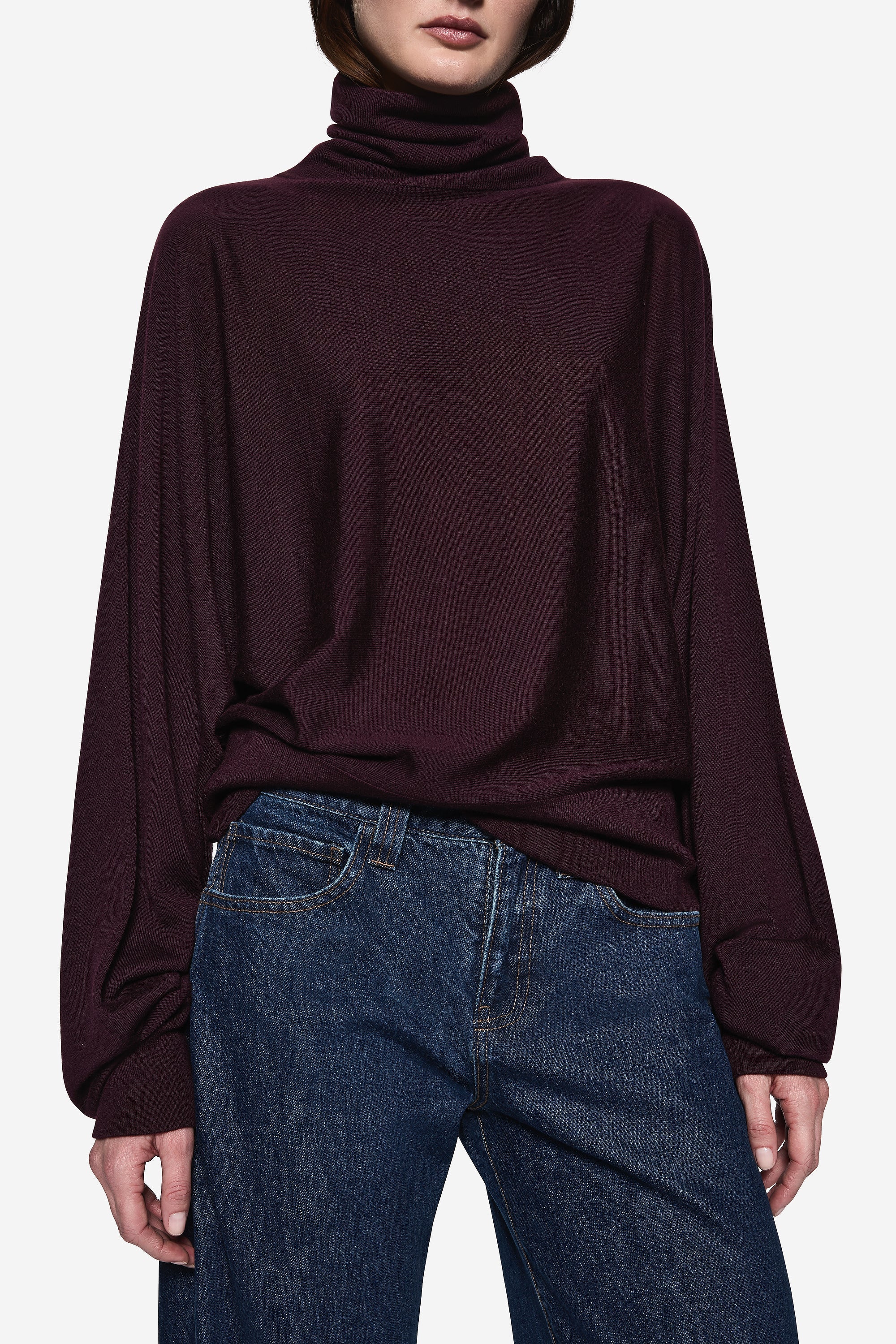 Eggplant merino high-neck sweater close-up, ribbed collar and long sleeves